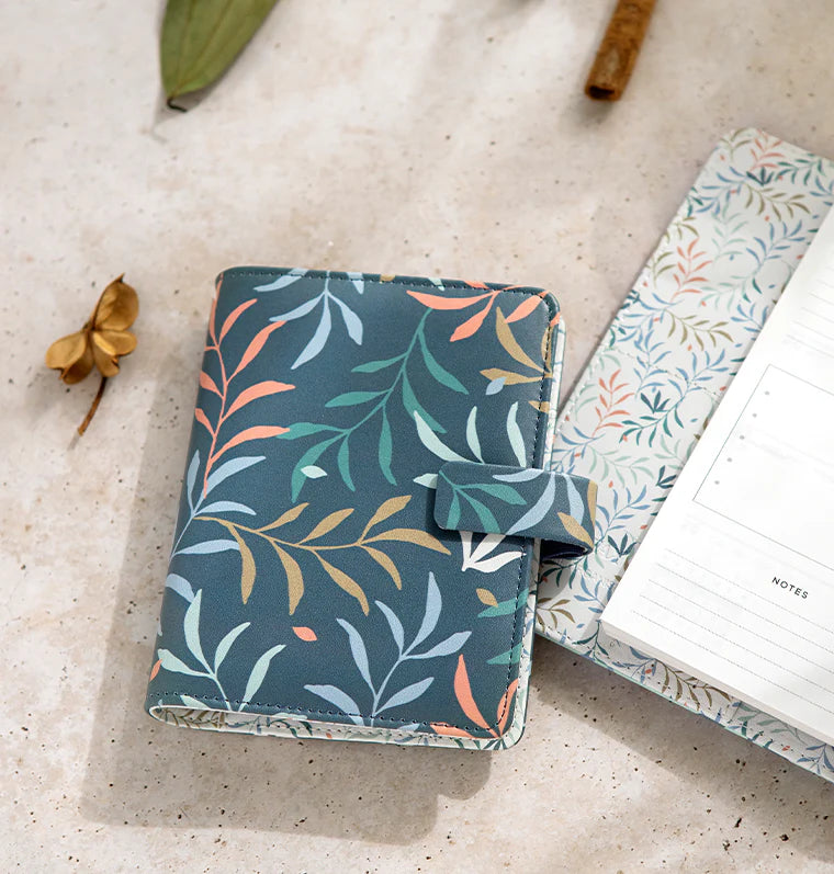 Filofax Botanical Pocket Organiser in Blue on desk